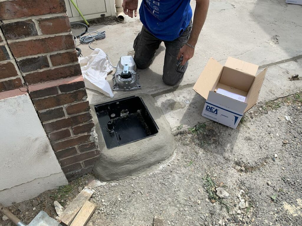 pose-moteur-enterre-portail-monprojethabitat Le montage d'un moteur de portail enterré